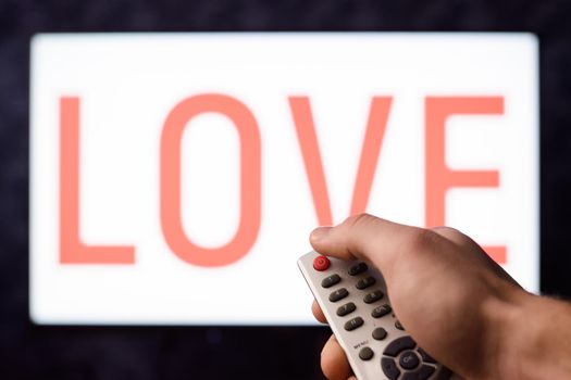 Man get bored with love decides to give it up pressing red button on a remote controller