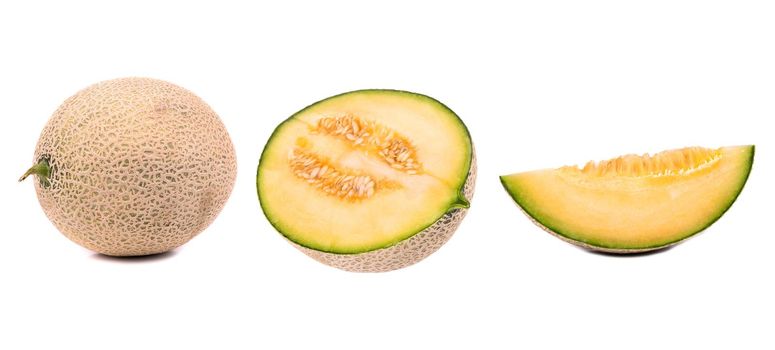 Set of yellow melon with greenish juicy pulp and slices. Honey melon with cut out piece, isolated on white background.