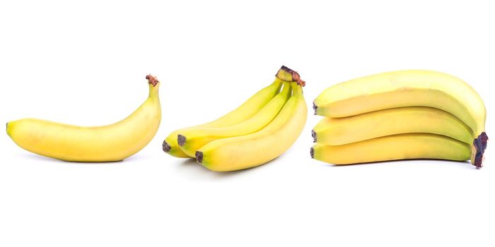 Collection of yellow bananas isolated on white background.