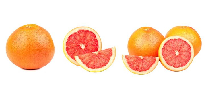 Set of fresh whole and cut grapefruit and slices isolated on white background.