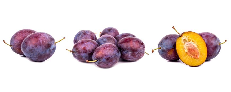 Set of red plum fruits with green leaves and slice isolated on white.