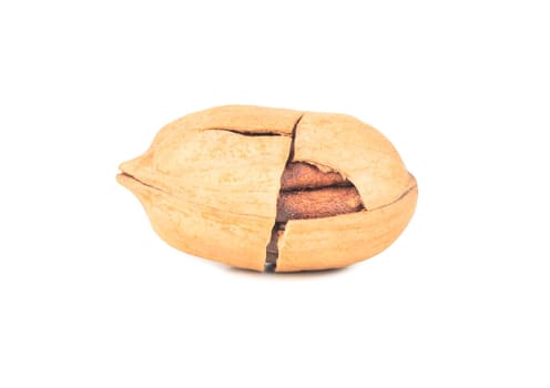 Pecan nut in cracked shell isolated on white background