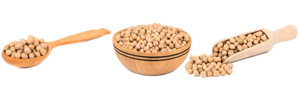 Dry chickpeas in wooden containers isolate on white background, collection