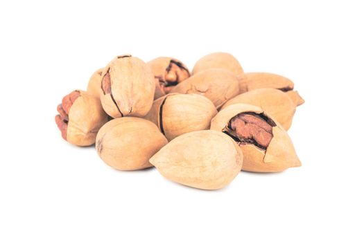 Bunch of inshell pecans on white background