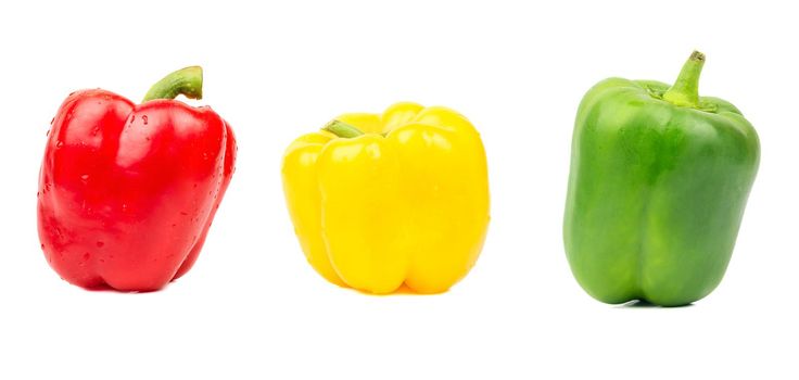 set of colored bell peppers isolated on white background.