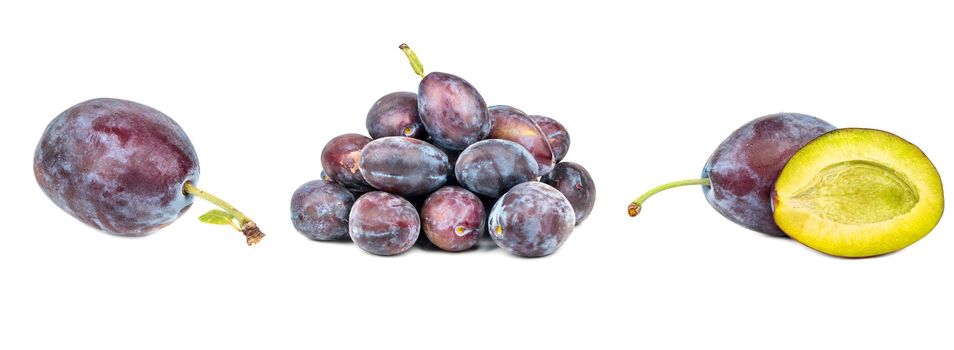 Set of red plum fruits with green leaves and slice isolated on white.