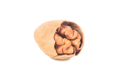 Pecan nut with broken shell isolated on white background