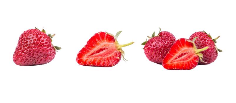 Set of strawberries in a cut and whole, with a spine, isolated on a white background.