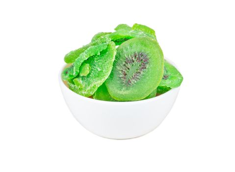 Dry kiwi slices in a ceramic bowl isolated on white background