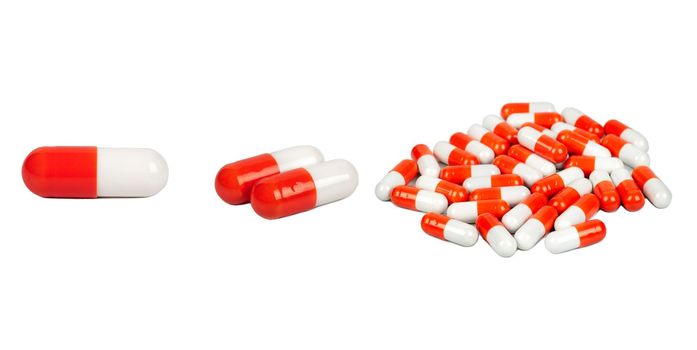 Red-white capsules isolate on white background, set