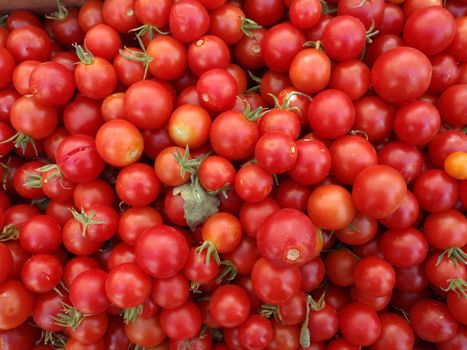 Bunch of Rosy Red Cherry Tomatos at a Farmers Market in San Francisco    