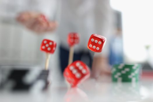 Closeup of man throwing dice. Gambling concept