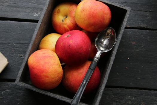 Ripe red apples on wooden table. Top view. High quality photo