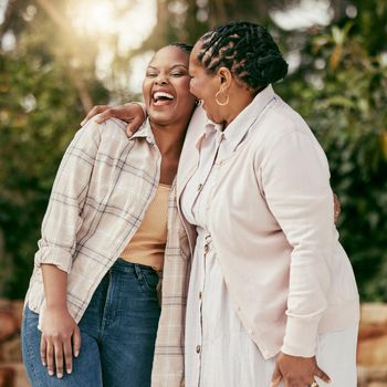 Shot of a mother and daughter embracing at home.