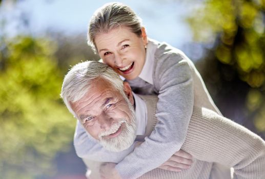 Shot of a senior couple bonding outdoors together.