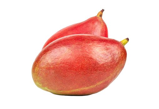 Two delicious red mango fruit closeup isolated on a white background