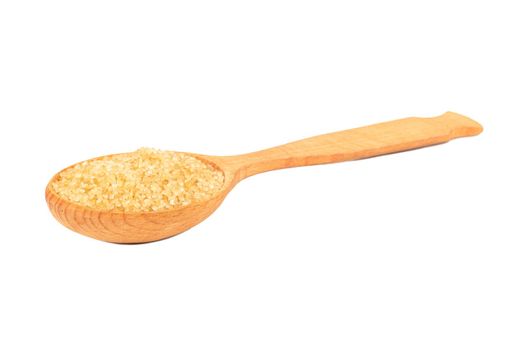 Wooden spoon with brown sugar isolated on white background