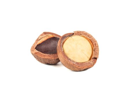 Split macadamia nut isolated on white background