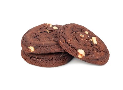Three chocolate cookies with coconut slices on a white background