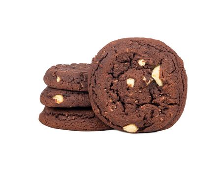 Stack of chocolate cookies with coconut slices on a white background