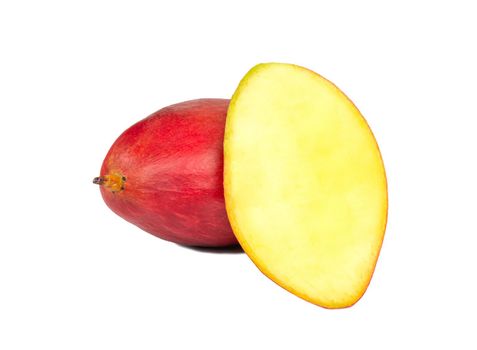 Mango fruit with juicy half on a white background