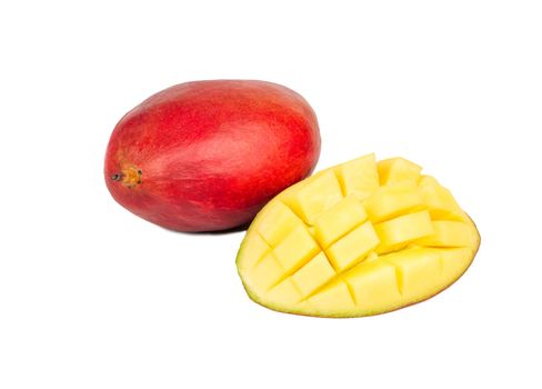 Mango with juicy half isolated on white background