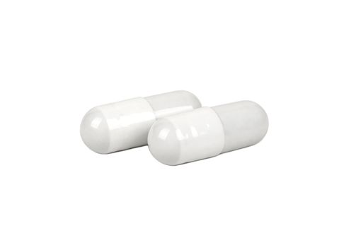 Two grey capsules isolated on a white background