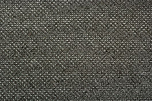 Textured dark fabric background close up