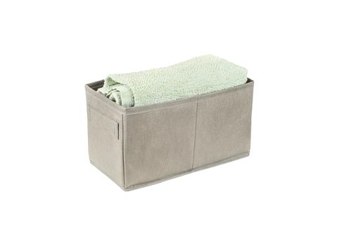 Beige box with a towel isolated on a white background