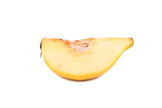Slice of ripe quince fruit isolated on white background
