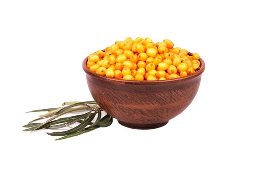 Full bowl of fresh sea buckthorn berries with leaves on a white background