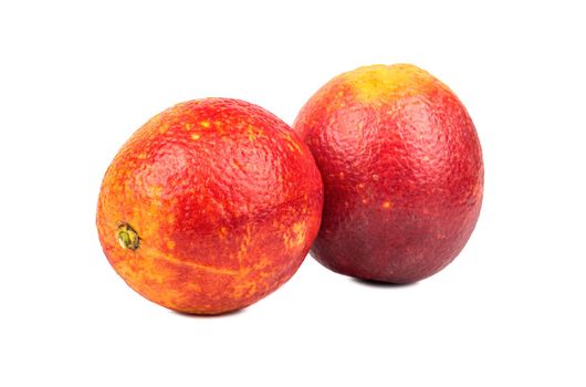 Two red Sicilian orange on a white background