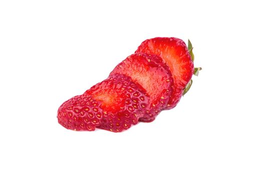 Ripe fresh strawberries cut into four slices on a white background