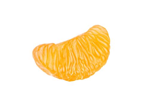 Juicy slice of fruit mandarin closeup on white background