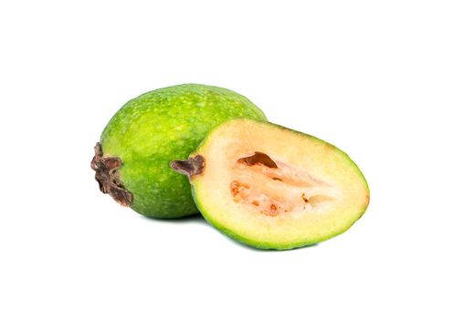 Tropical fruit feijoa cut to half on a white background