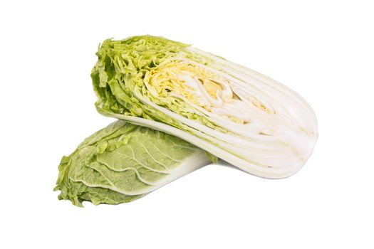 Fresh chinese cabbage cut into halves on white background