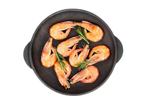 Fried shrimp with rosemary in a portioned frying pan isolated on white background, top view