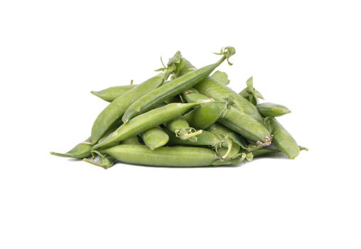 Pile of green peas in a pod on a white background