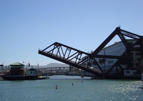 Third Street Bridge lowers after letting a boat go under it.  Next to ATT Park in San Fracancisco California.                               