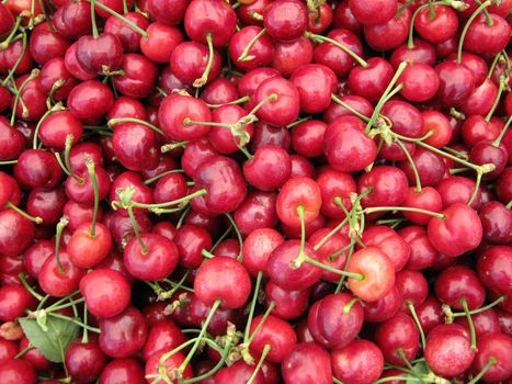 Pile of Organic Cherries making a cool pattern found a farmers market         