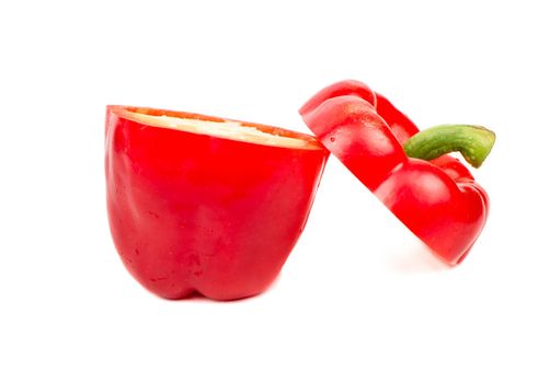 Cut in half fresh red pepper on white background