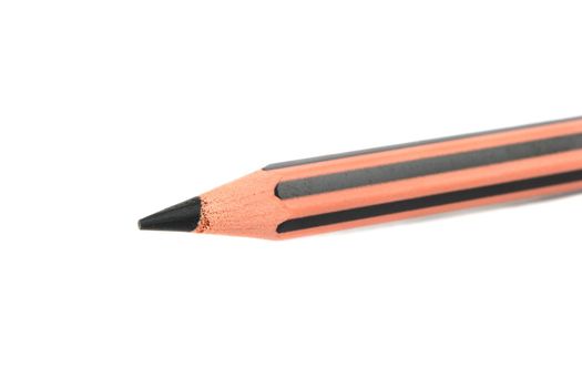 Black pencil close up on white background