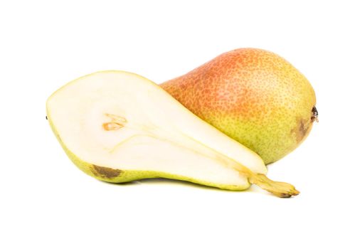 Fresh juicy pear with half on white background