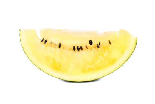 Juicy slice of yellow watermelon isolated on white background