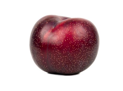 Big red plum isolated on white background