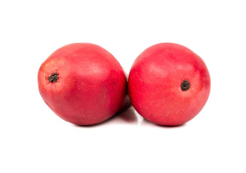 Two tasty red fruit pears isolated on a white background