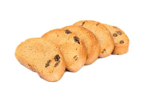 Folded several rusk with raisins on a white background