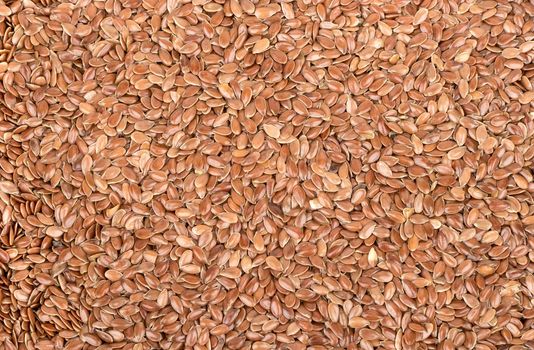 Background of the many flax seeds close up