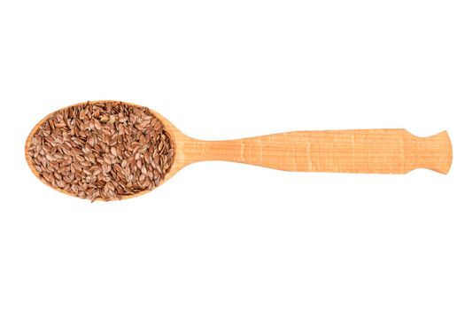 Flax seeds in wooden spoon isolated on white background, top view