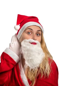 Girl in Santa costume holding hand near your ear on white background
